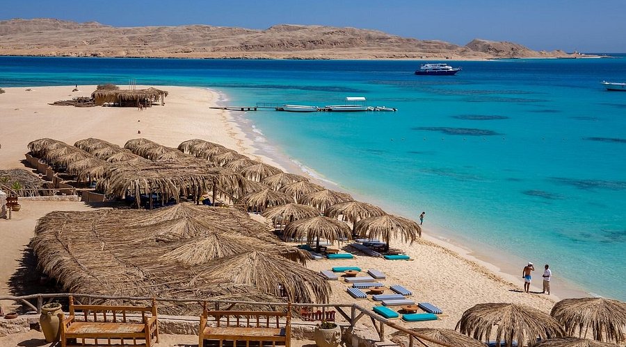 Paradise Island beach palm umbrellas Red Sea Hurghada